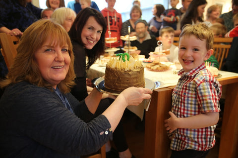 Sheila, Mairi and peerie Hamish with Sheila's birthday cake