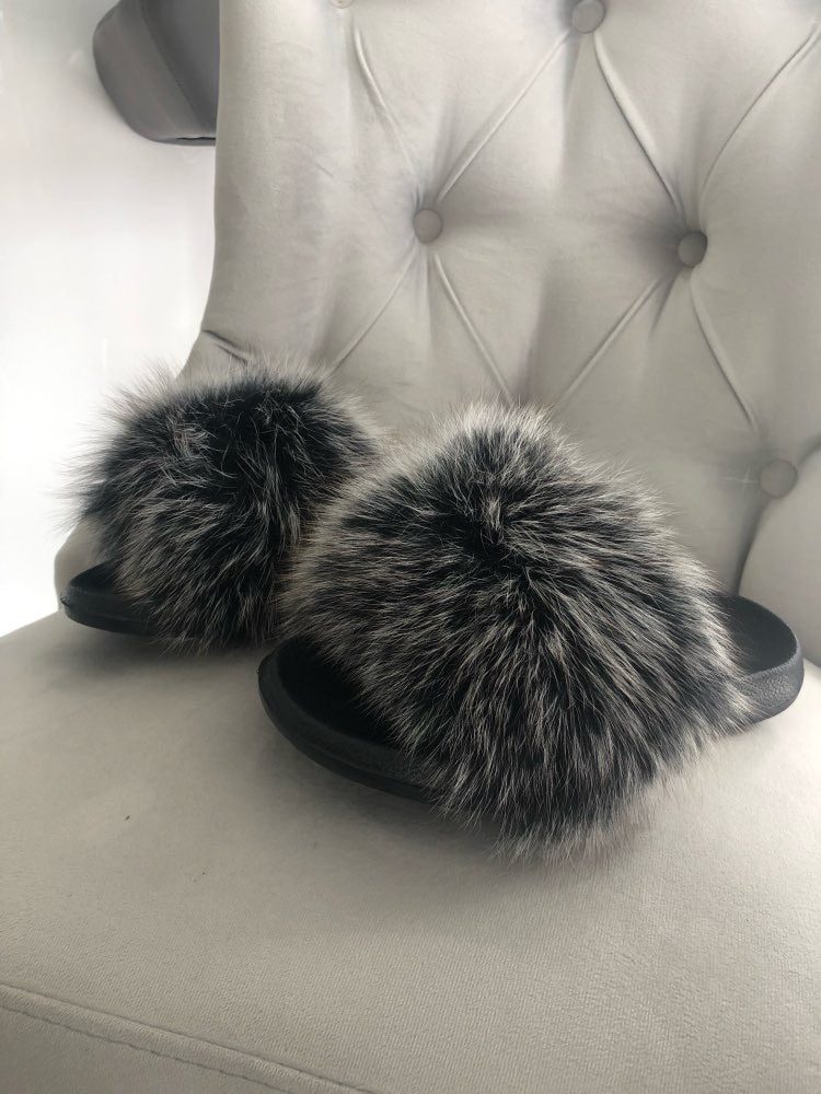 grey faux fur slides