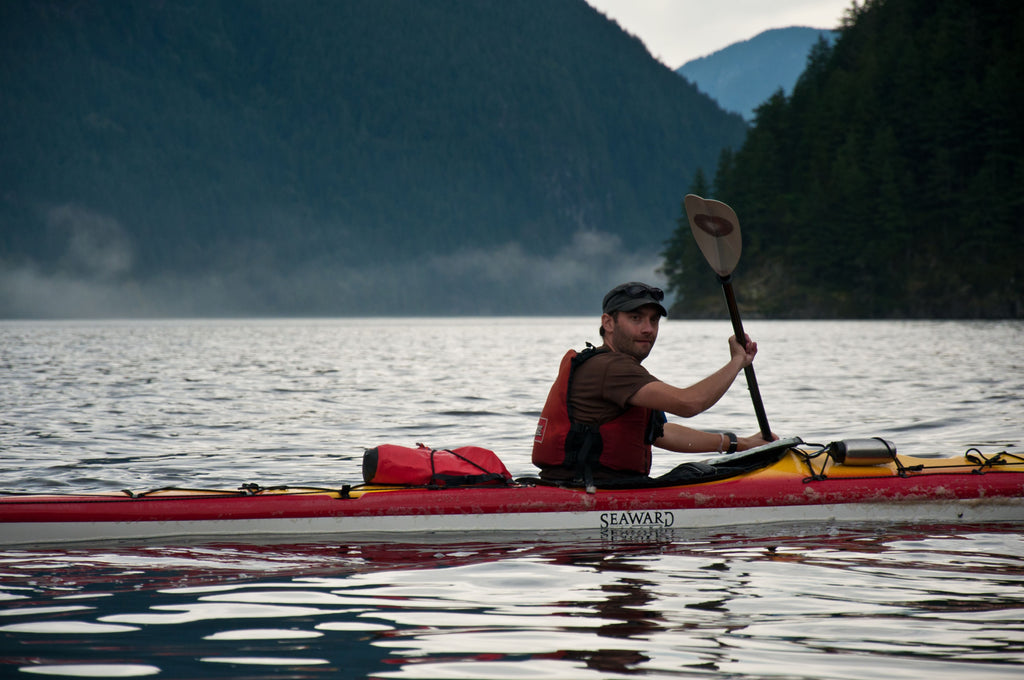 kayaker paddling off the west coast of Canada 