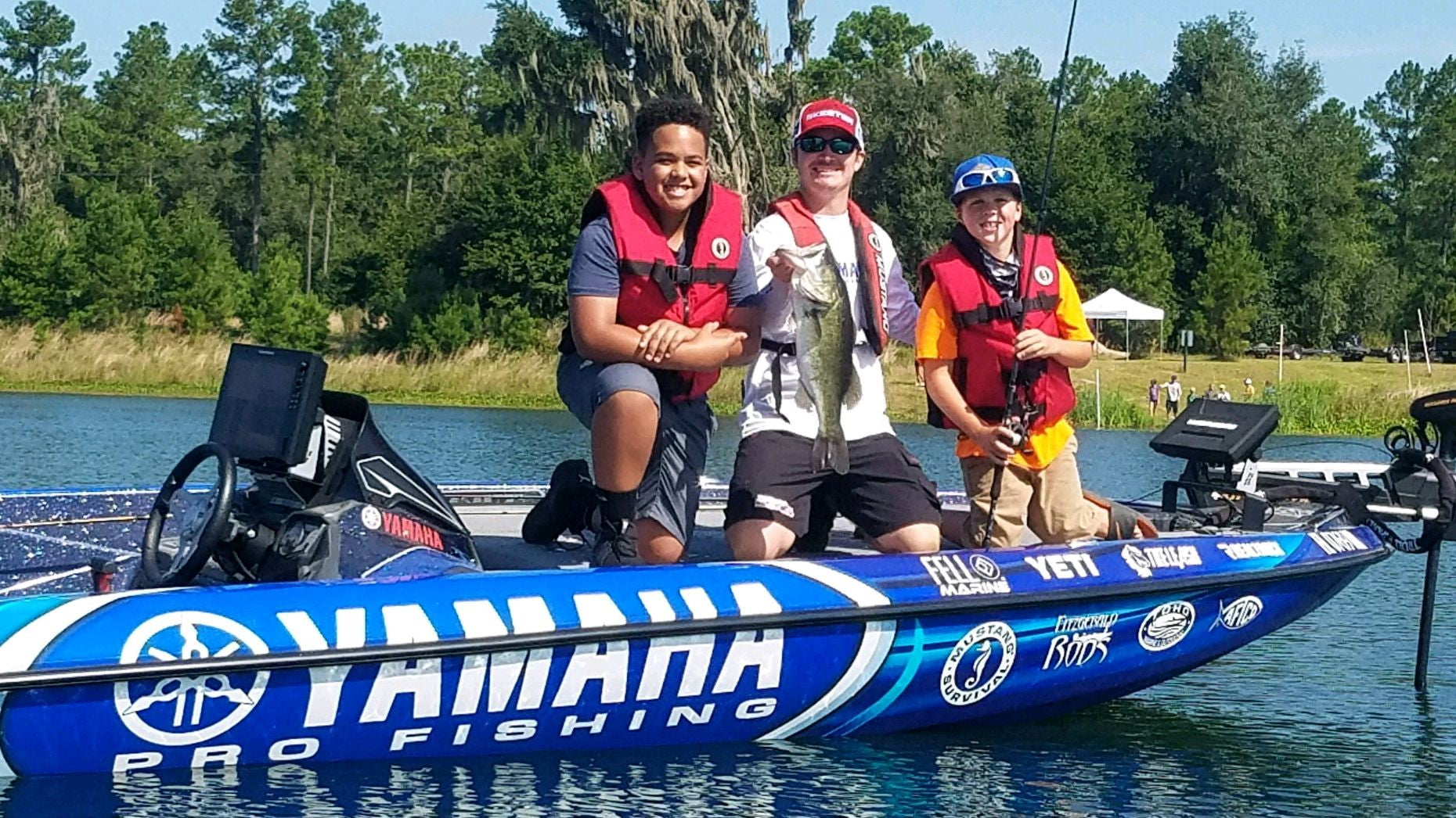 hunter bland and 2 kids fishing