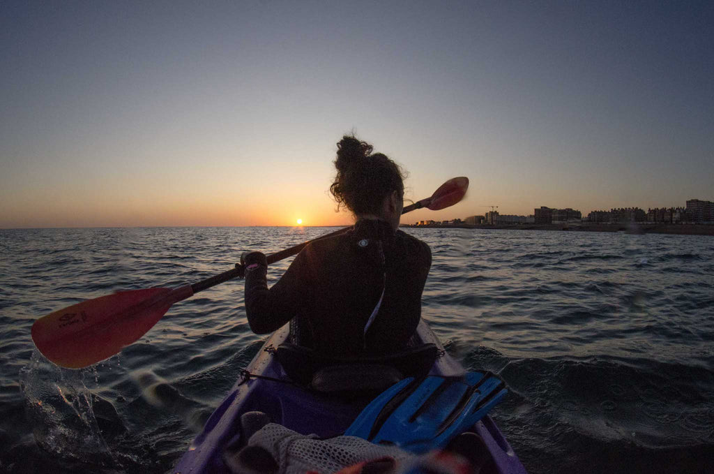 Kayaking at sunset towards Brighton