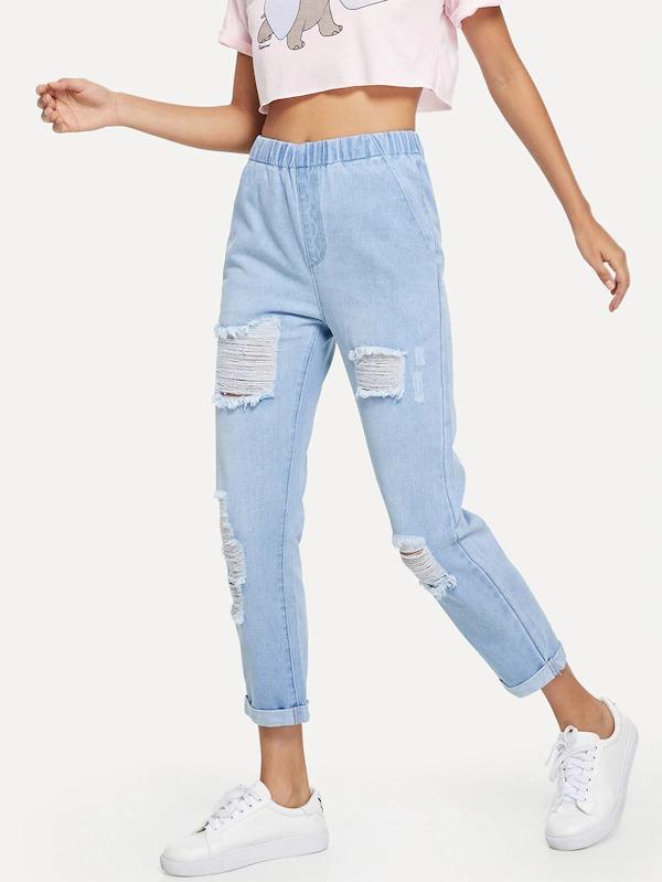 light wash blue ripped jeans