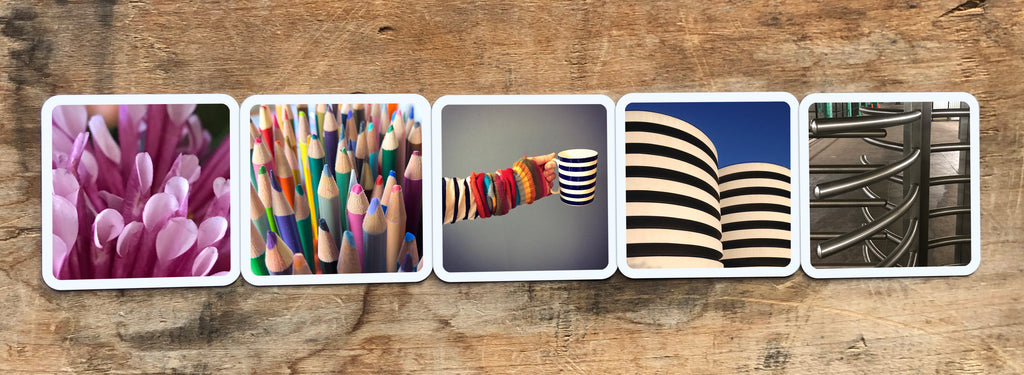 5 OuiSi photo cards in a row. Each card connects visually with the one next, sharing similar patterns, shapes and colors (for example, two cards have stripes)