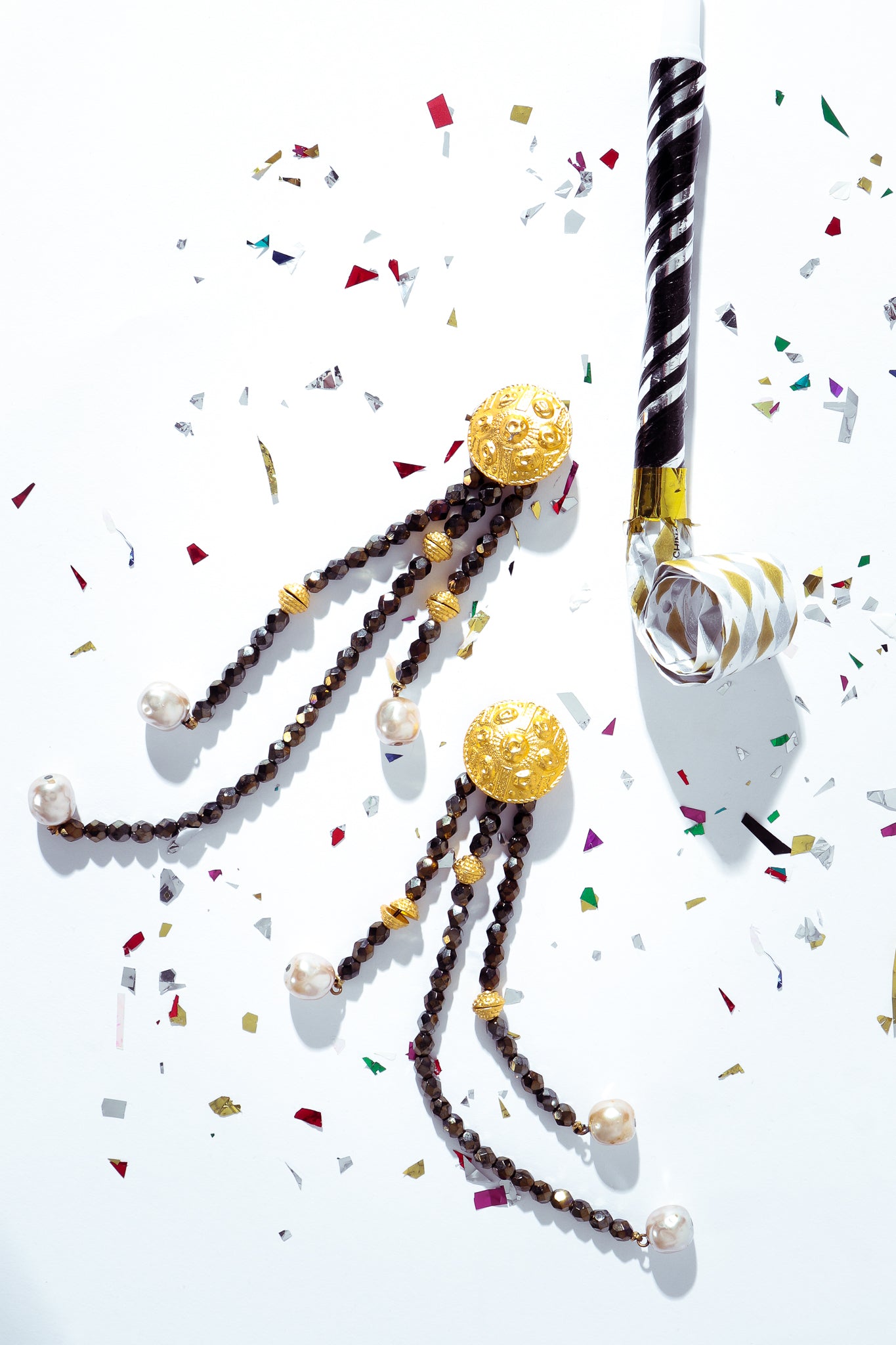 Recess Dresscode New Ear's Sparklers: Carlos falchi bead drop earrings with confetti & horn