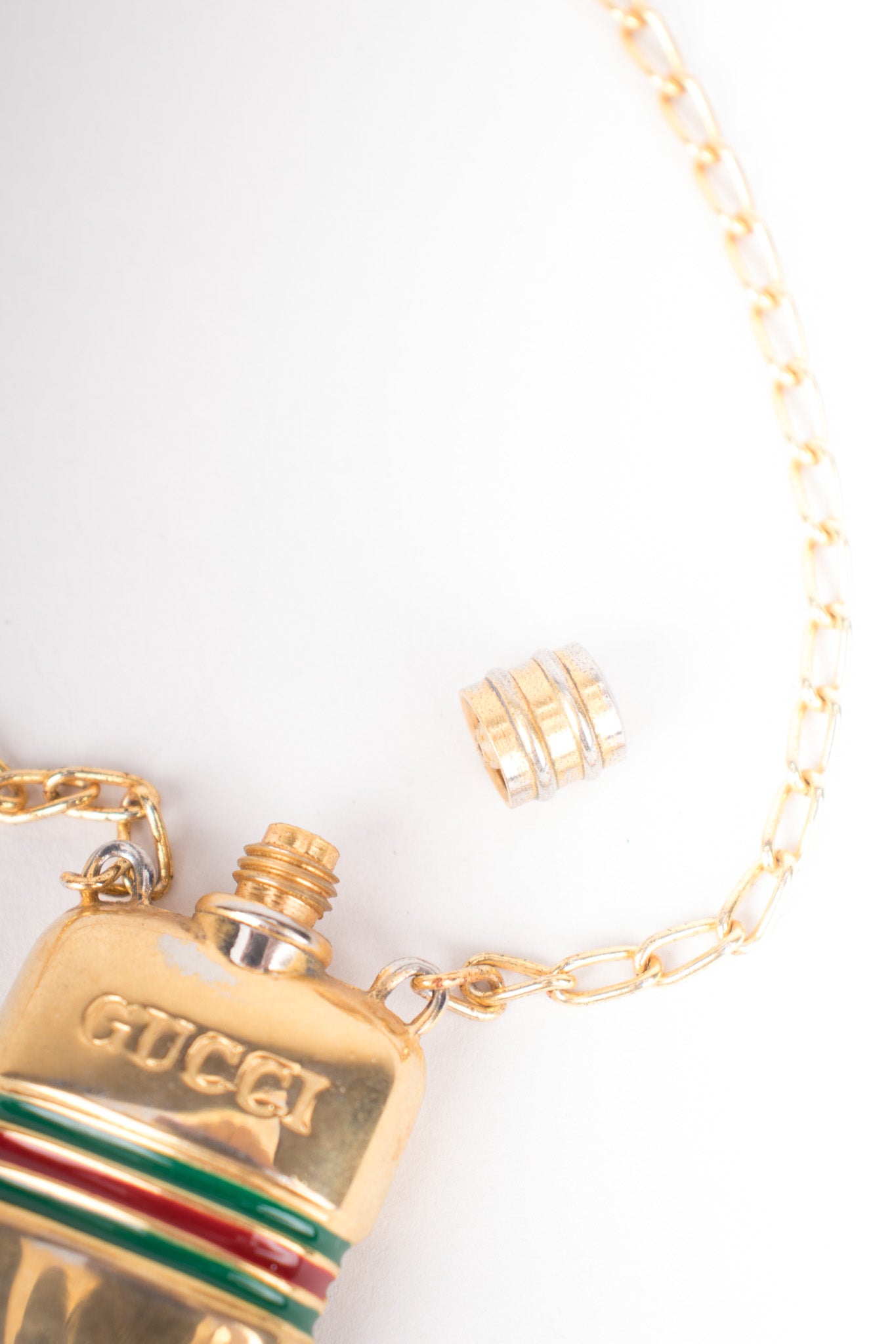 gucci perfume necklace