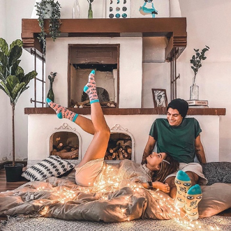 The lovely couple Timmy Mowafi and Farah Hosny wearing evil eye socks from Tale of Socks