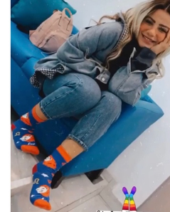 Emma Abdelaziz wearing Leo Zodiac sign crew socks from Tale of Socks