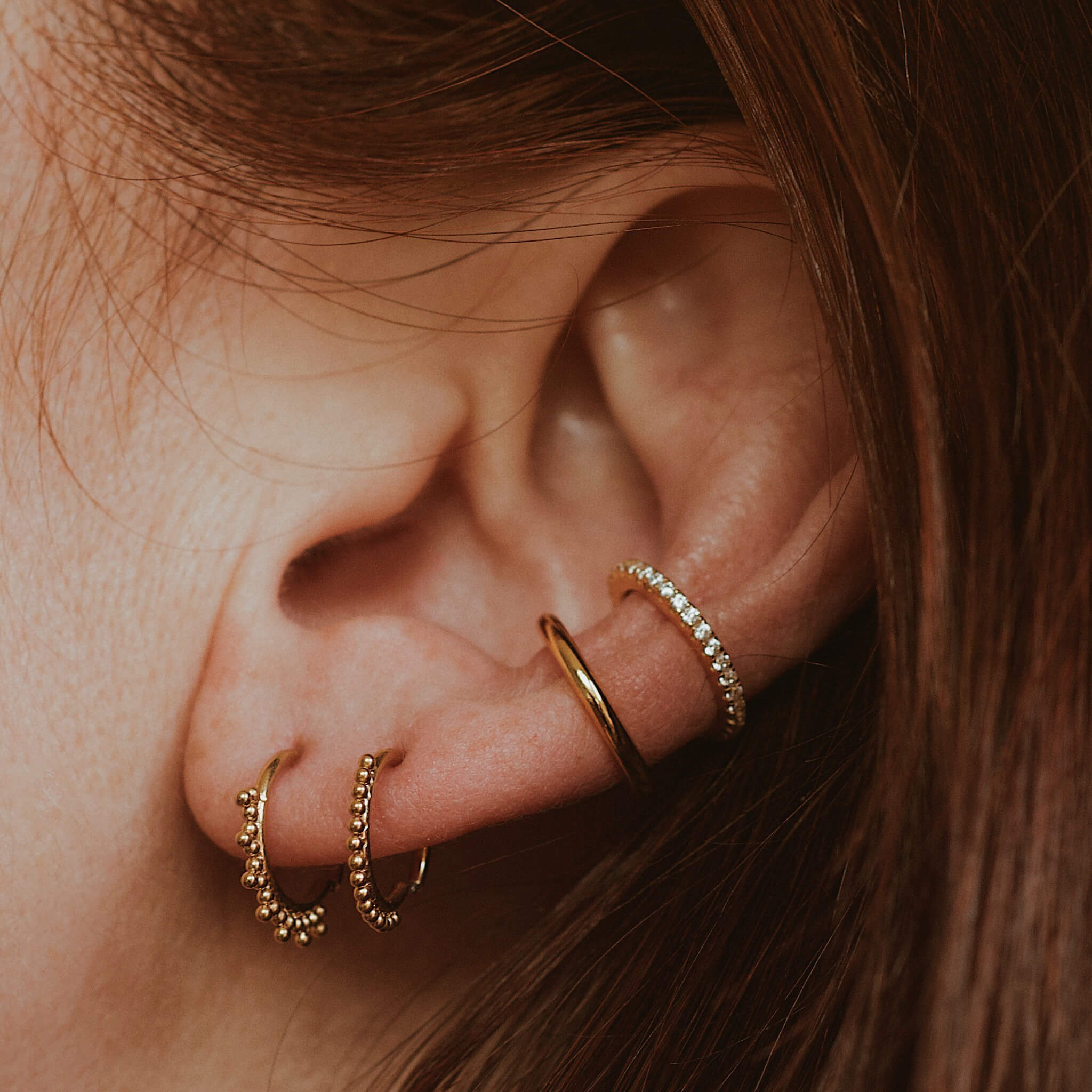 Siren Cartilage Hoop in Gold on model