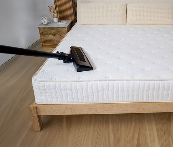 Vacuuming mattress