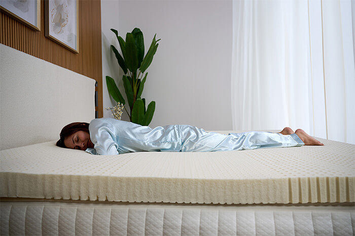 Latex mattress topper for stomach sleepers