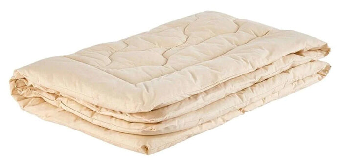 medium firm mattress with a cozy comforter for hot sleepers