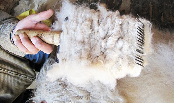 why is cashmere so expensive blog combing cashmere fibres by seahorse silks