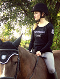 Equestrian ista shimmer long sleeve worn while schooling.