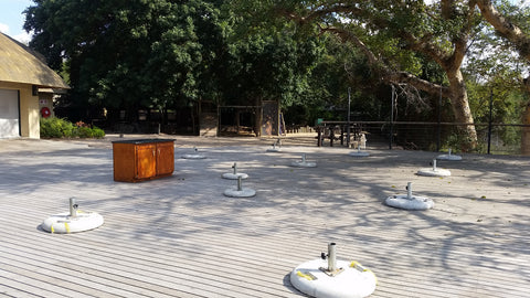The Cattle Baron deck at Skukuza, empty except for a few surprised Vervet monkeys. Image: Into the Kruger