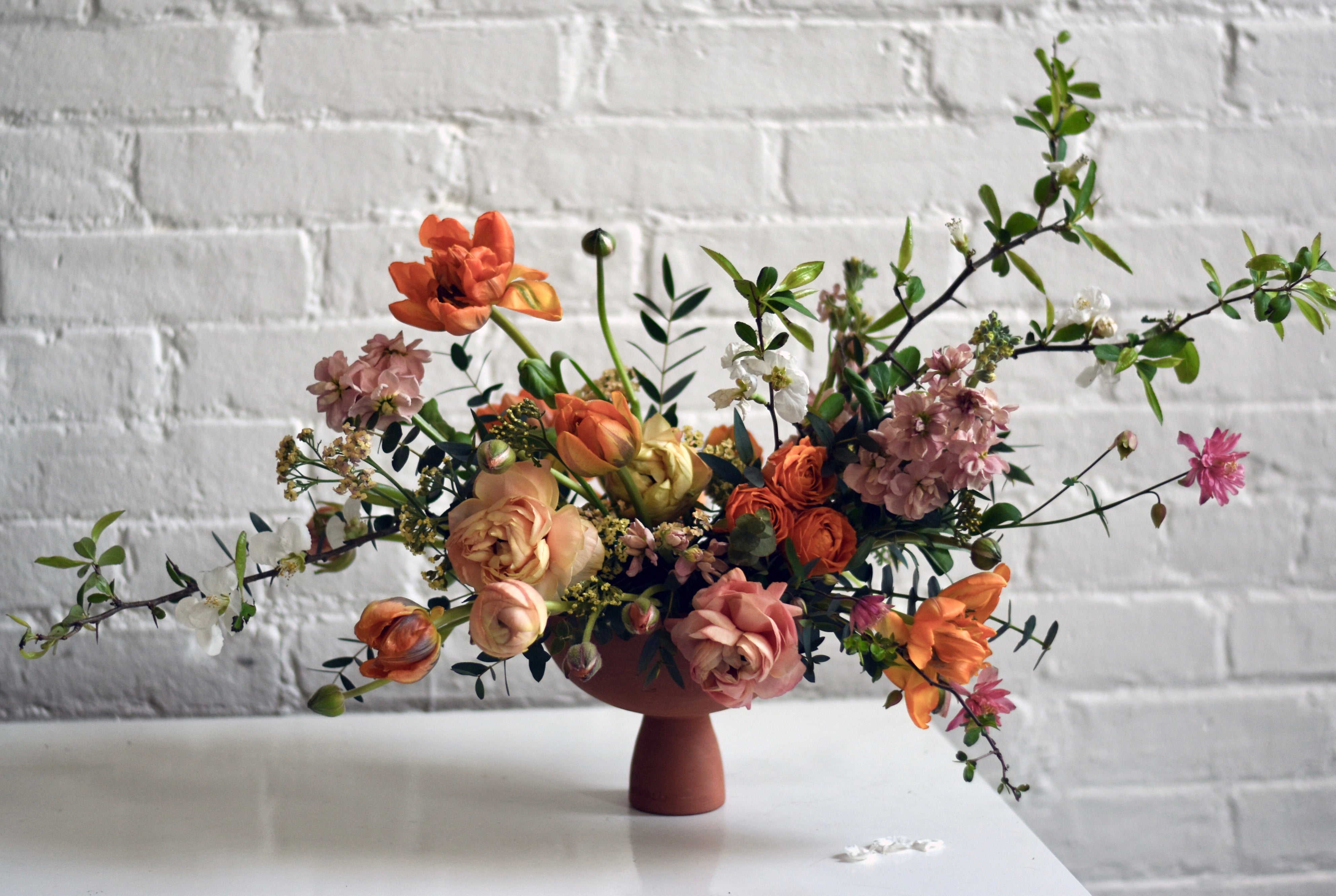 Floral arrangement in Matagalan Plantae vase by Tin Can Studios