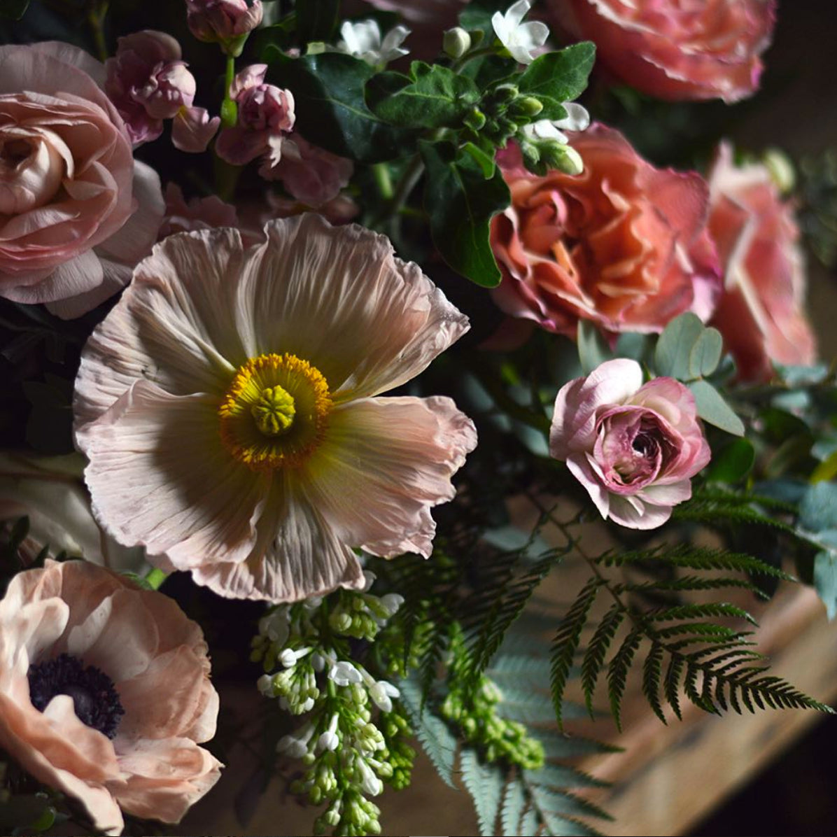Picture of poppy and anemones in pale pinks