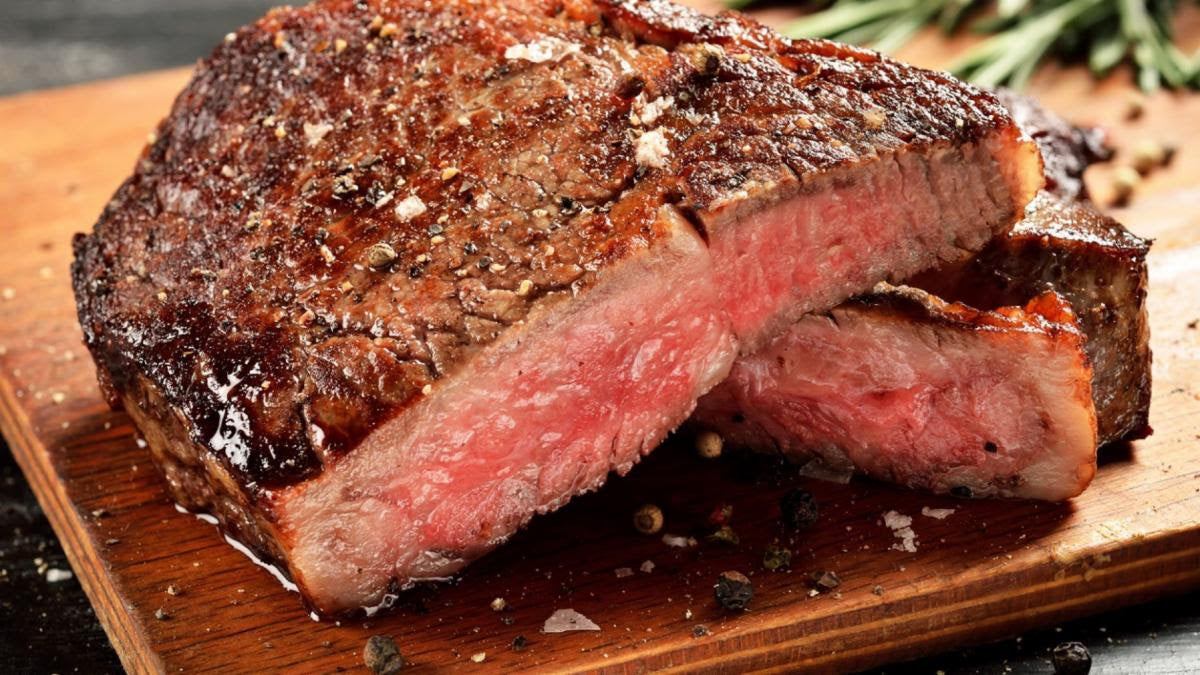 A picture of Dan and Lynne's Air Fryer Steak cut open to show the medium rare inside