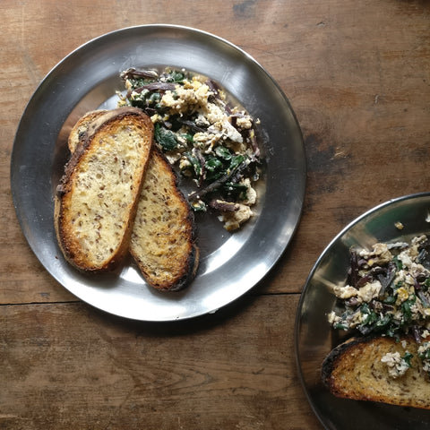 sourdough, scrambled egg and greens