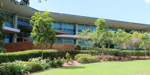 St Paul's campus - a double story building in front of a green lawn and trees