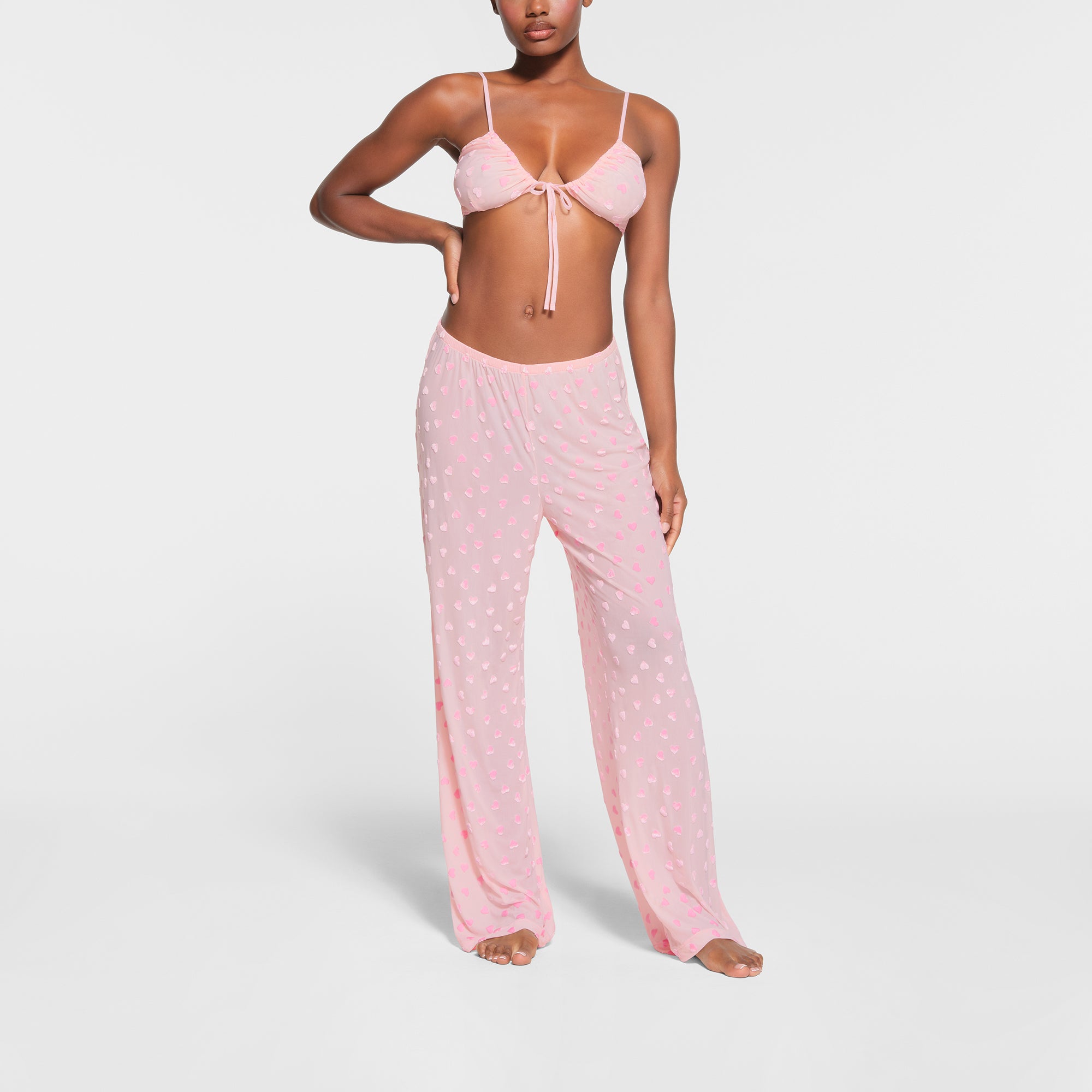 SKIMS Cozy Straight-leg Mid-rise Boucle Knitted Trousers - Rose