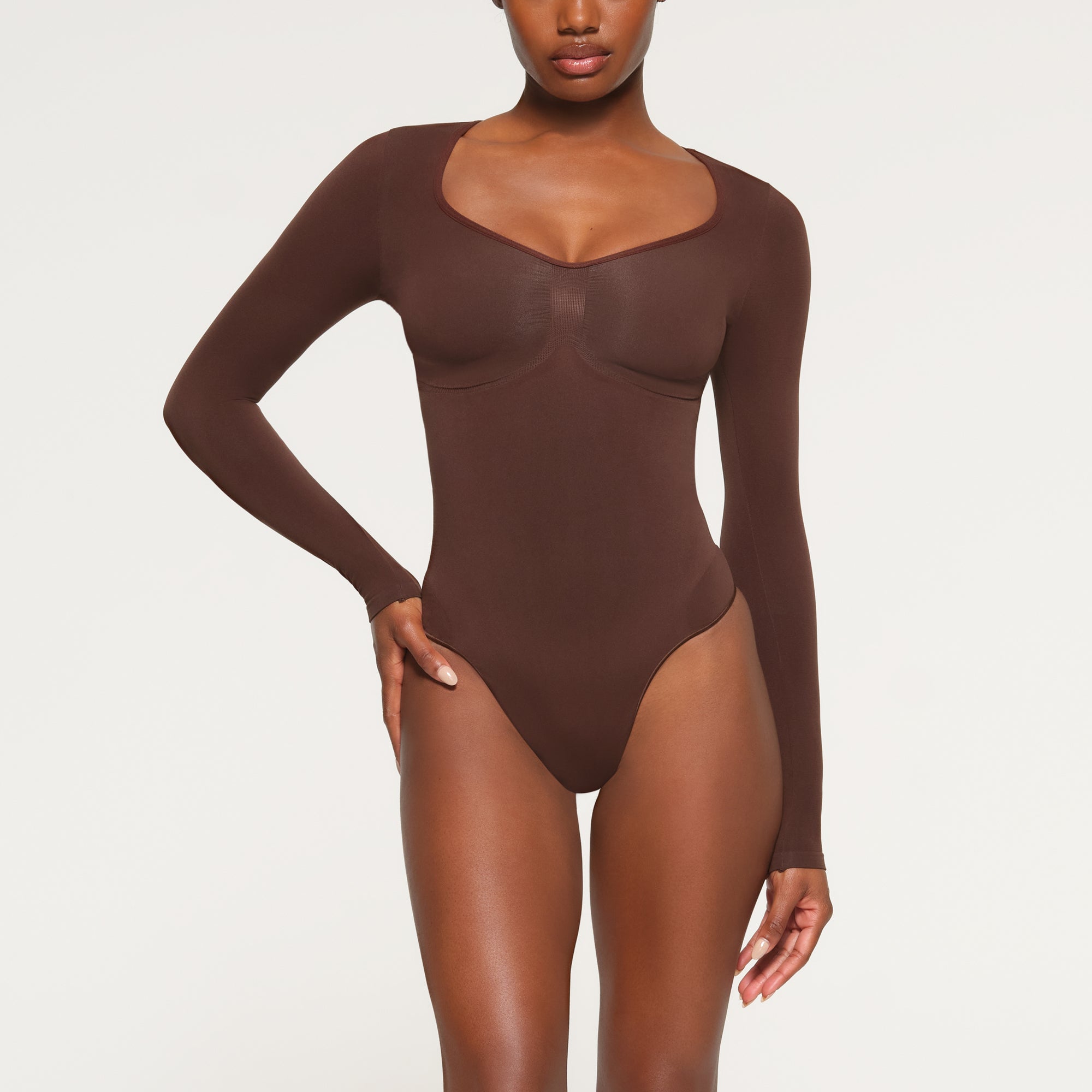 Skims Seamless Sculpt Long Sleeve Thong Bodysuit In Stock Availability