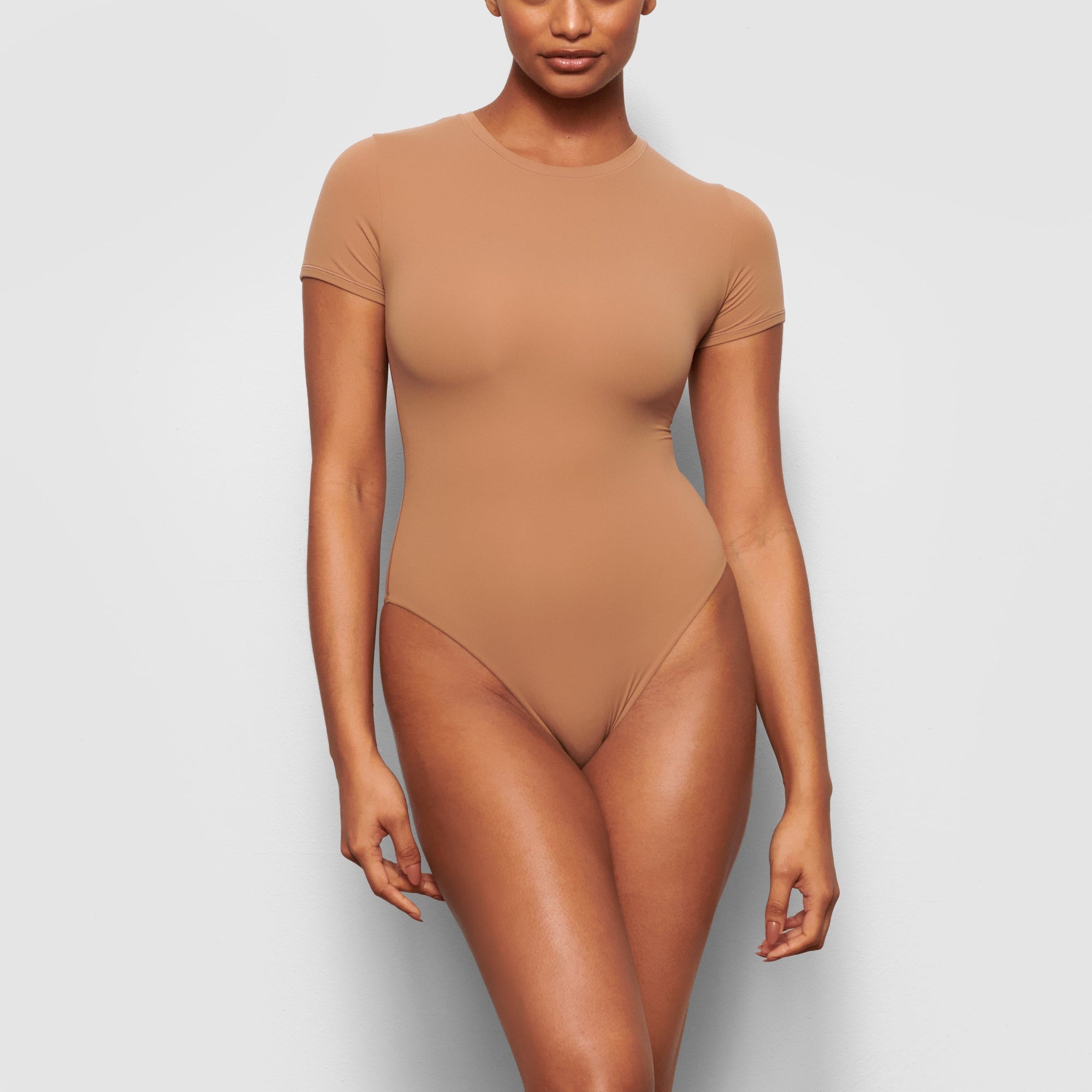 SKIMS Brown Bodysuit , Size Medium. Color is Sienna