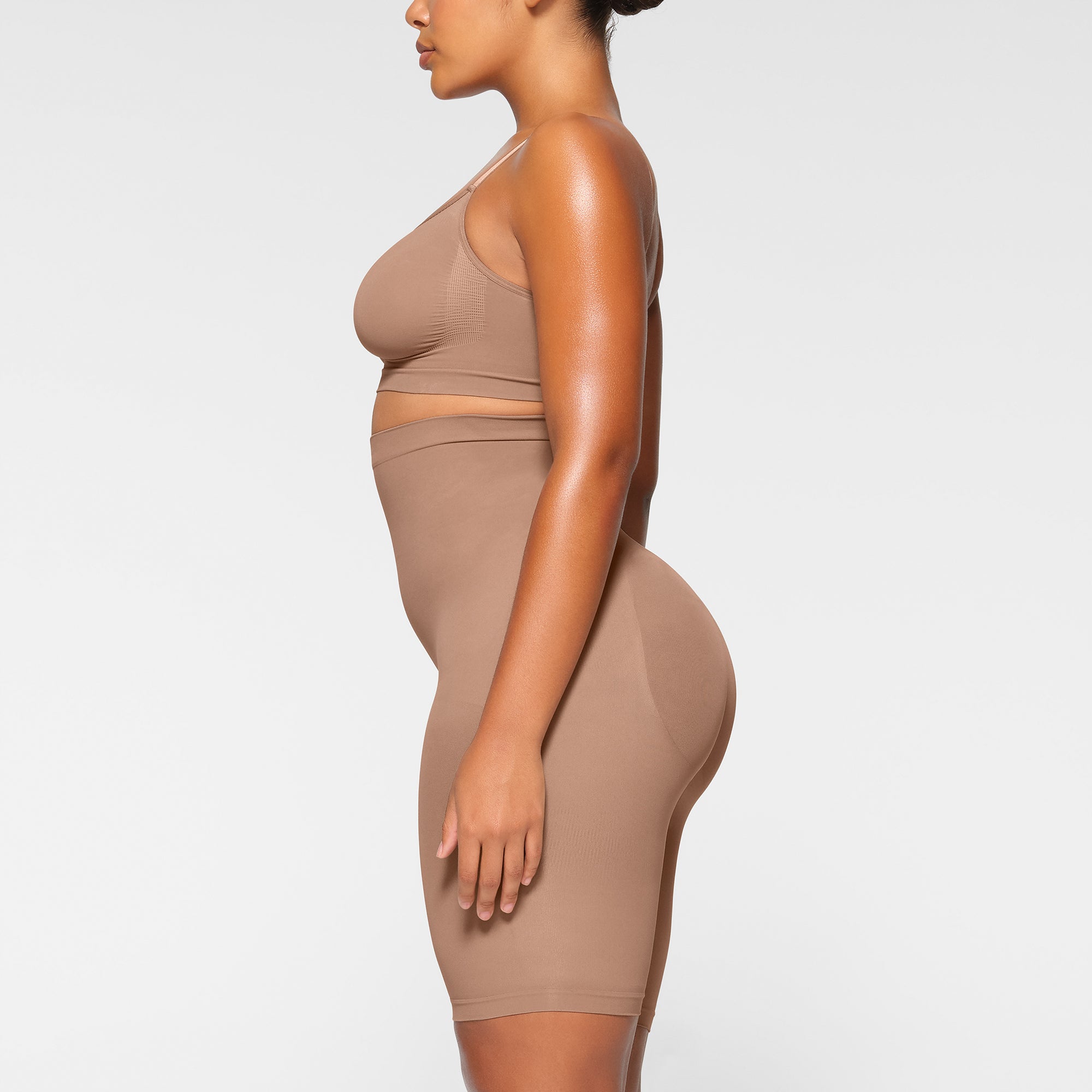 SKIMS on X: The Sculpting Short Above the Knee ($36 in sizes XXS-5XL) in  Mica. Designed by @kimkardashian, SKIMS's shorts have a slightly flared leg  opening - meaning they won't roll up