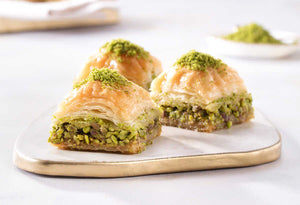 Fresh Square Baklava with Pistachio on Tray
