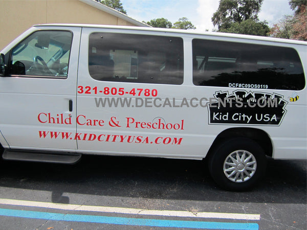 Kid City USA. Van graphics, tent heat press, signs and more...