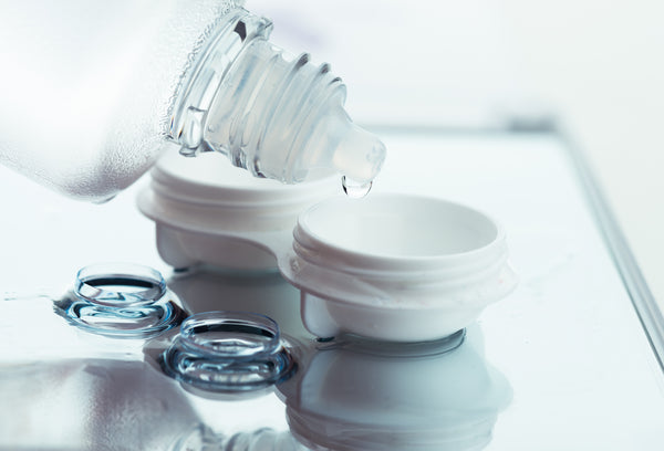 Contact lenses with contact lens case and contact solution