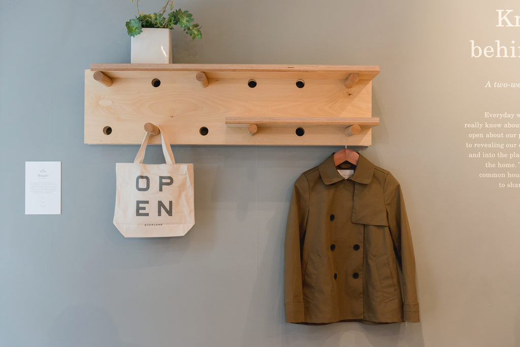 A custom coat rack at Everlane's Open House via Simply Framed 