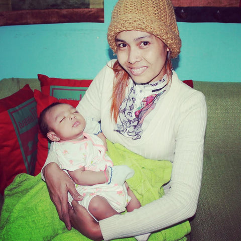 Cambodian artisan mother and baby daughter