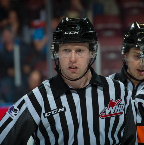 Linesman Cody Wanner looks through his visor during a WHL hockey game