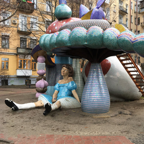 Alice In Wonderland Sculpture in Park Landscape Alley in Kiev, Ukraine.