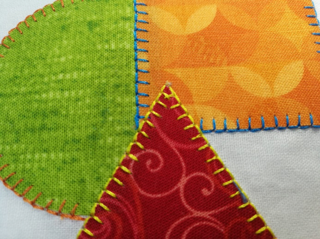 Applique (pronounced app-lee-KAY) is a French word that refers to the addition of small pieces of fabric onto a larger one to make a pattern or design by means of sewing or gluing. Quilting does not require applique, but appliqued quilts can be quite beautiful.