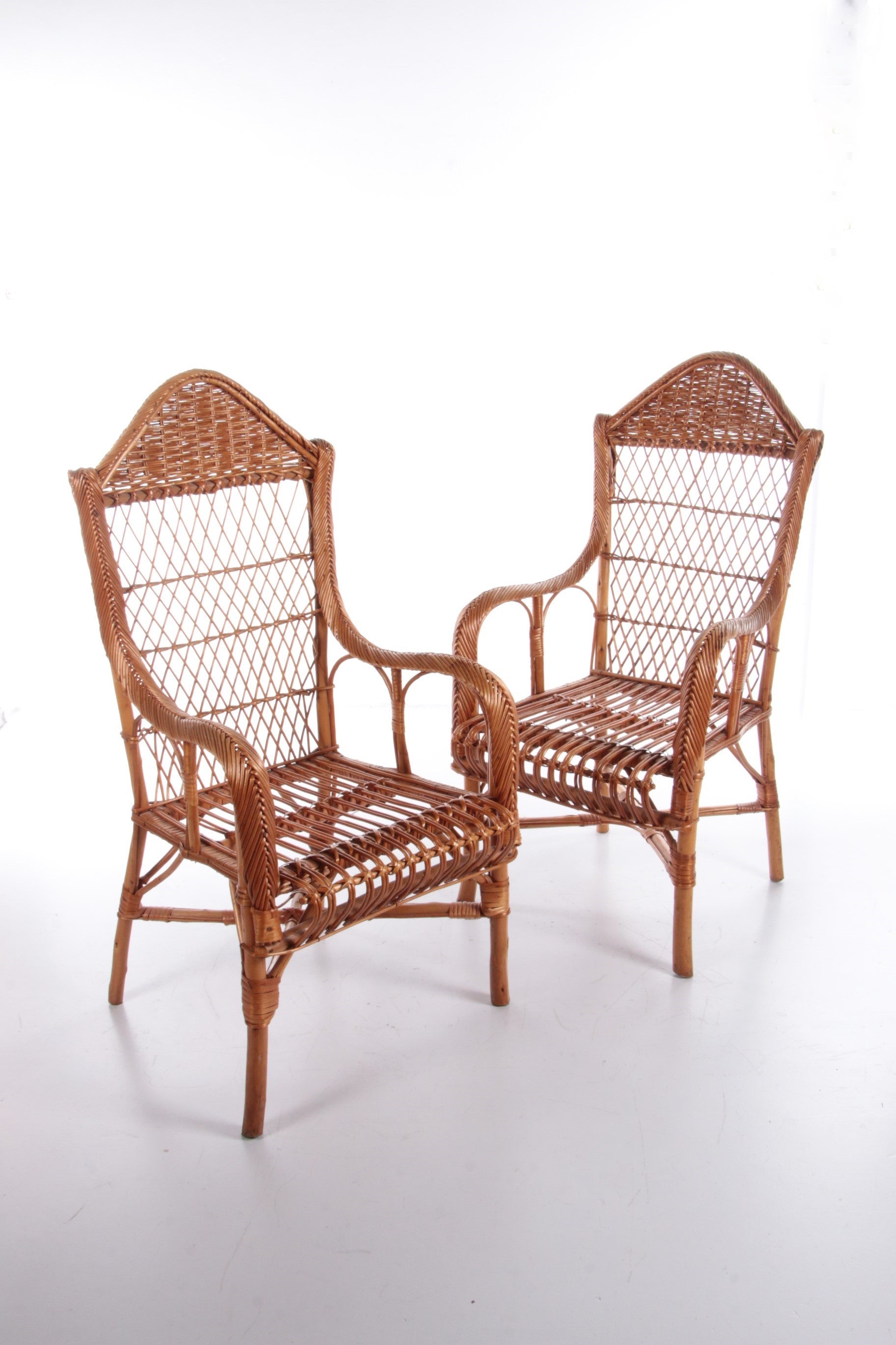 set van 2 Rotan stoelen gemaakt rond 1960s,Nederland. – Timeless-Art