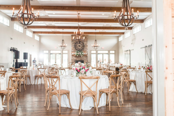 Table setting and flower arrangement blush colors vineyard wedding 
