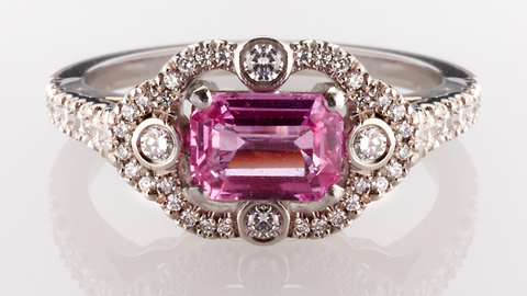 Ballerina ring with pink sapphire emerald-cut centrepiece stone