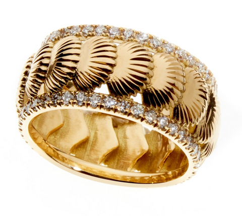 Sirena eternity ring with round brilliant diamond centrepiece stones