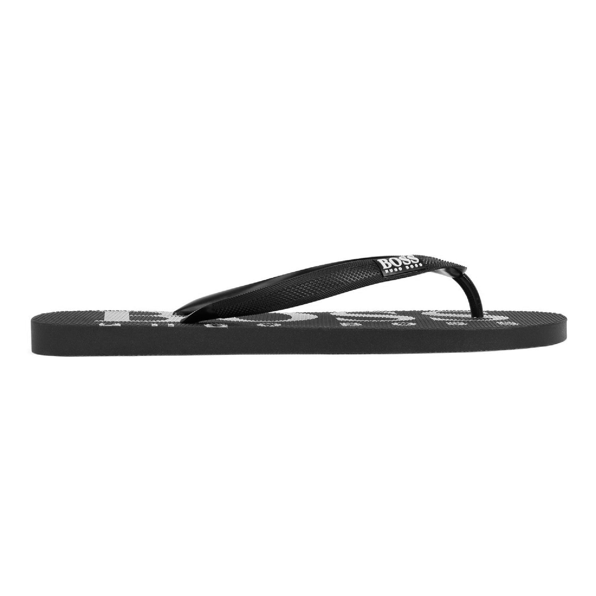 white hugo boss flip flops