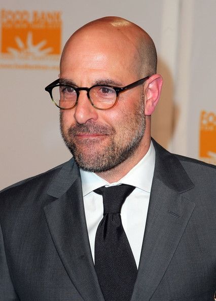  Stanley Tucci bald with reading glases