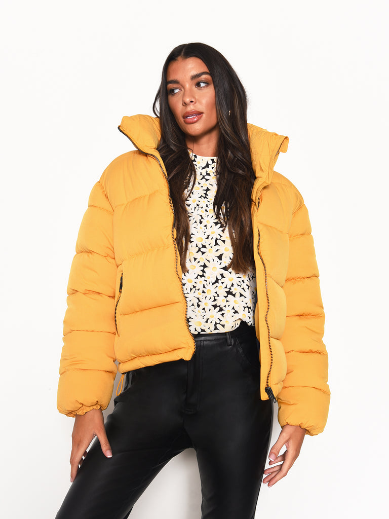 mustard yellow puffer jacket