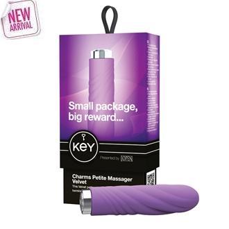 KEY CHARMS PETITE VELVET MASSAGER - LAVENDER 3.5" x 1" / 9cm x 2.5cm 5 intense patterns Soft and luxurious, body safe silicone Waterproof Hold for 3 seconds to turn off anytime Stainless alloy, easy push button Soft luxury lint free storage bag included Whisper quiet Uses 1 AA battery, not included One Year Warranty