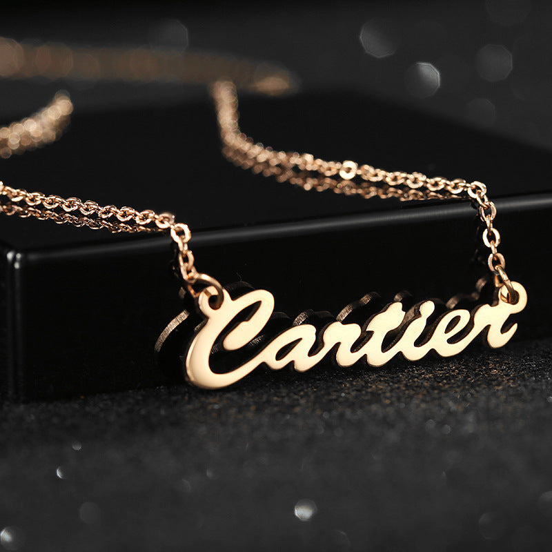 cartier letter pendant