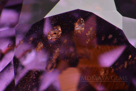 Solid Inclusions in Violetish Purple Spinel Gemstone