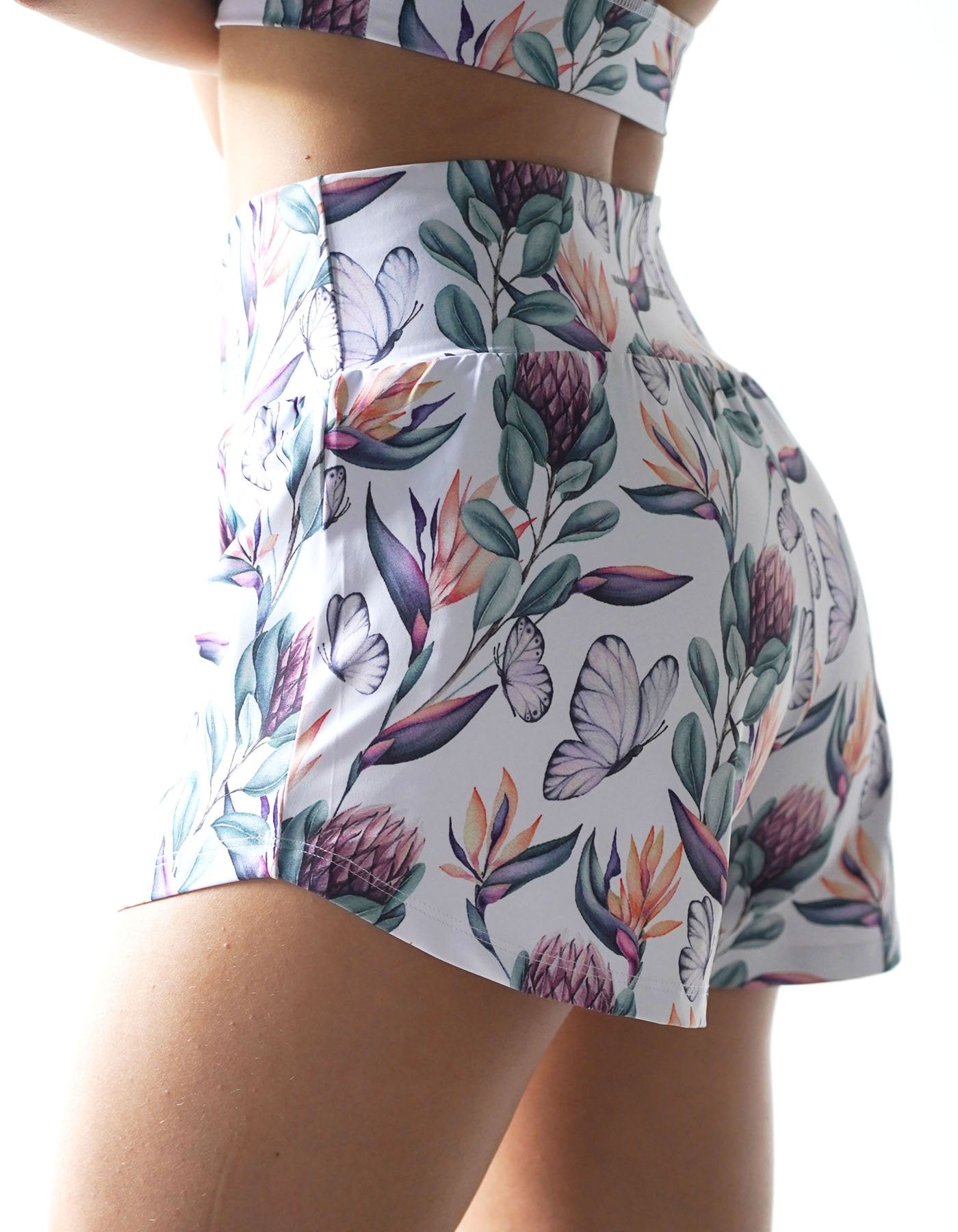 This is what dreams are made of. Crimson tavernorlando Island Dreams Runner shorts with the beautiful Island Dreams prints that have flowers & butterflies. 