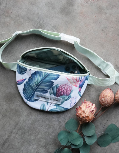 Crimson tavernorlando Tropical Paradise Fanny Pack featuring  a large zipper pocket to hold all your on the go essentials. Large straps that are adjustable