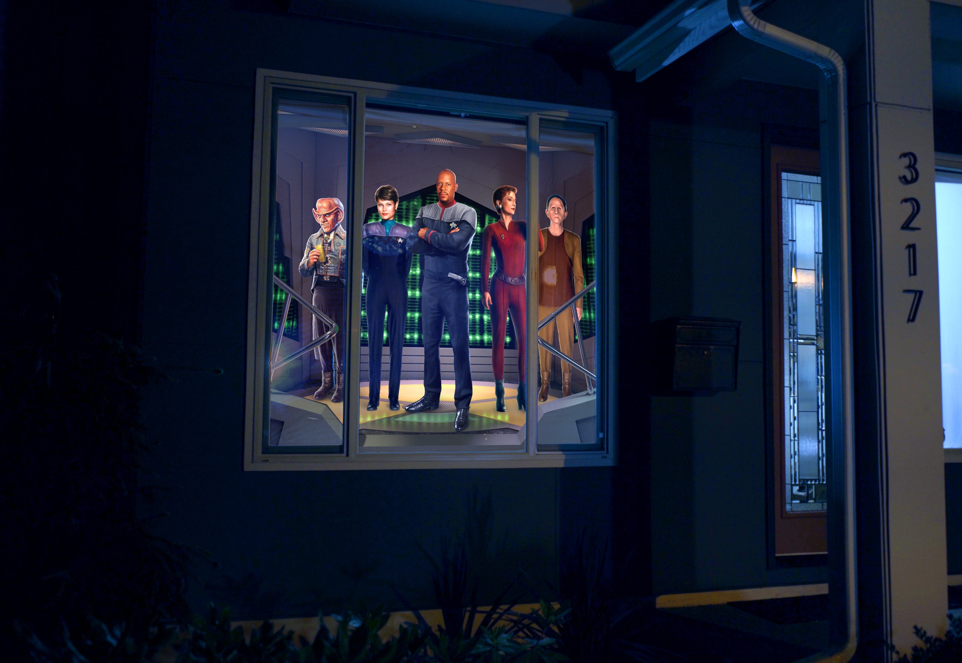 The crew of Deep Space Nine decorating a front window