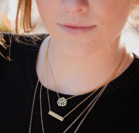 monogram necklaces layered