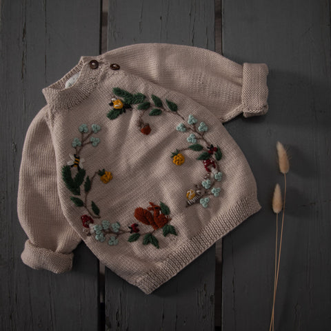 Hand knitted sweater for baby and child with embroidery details